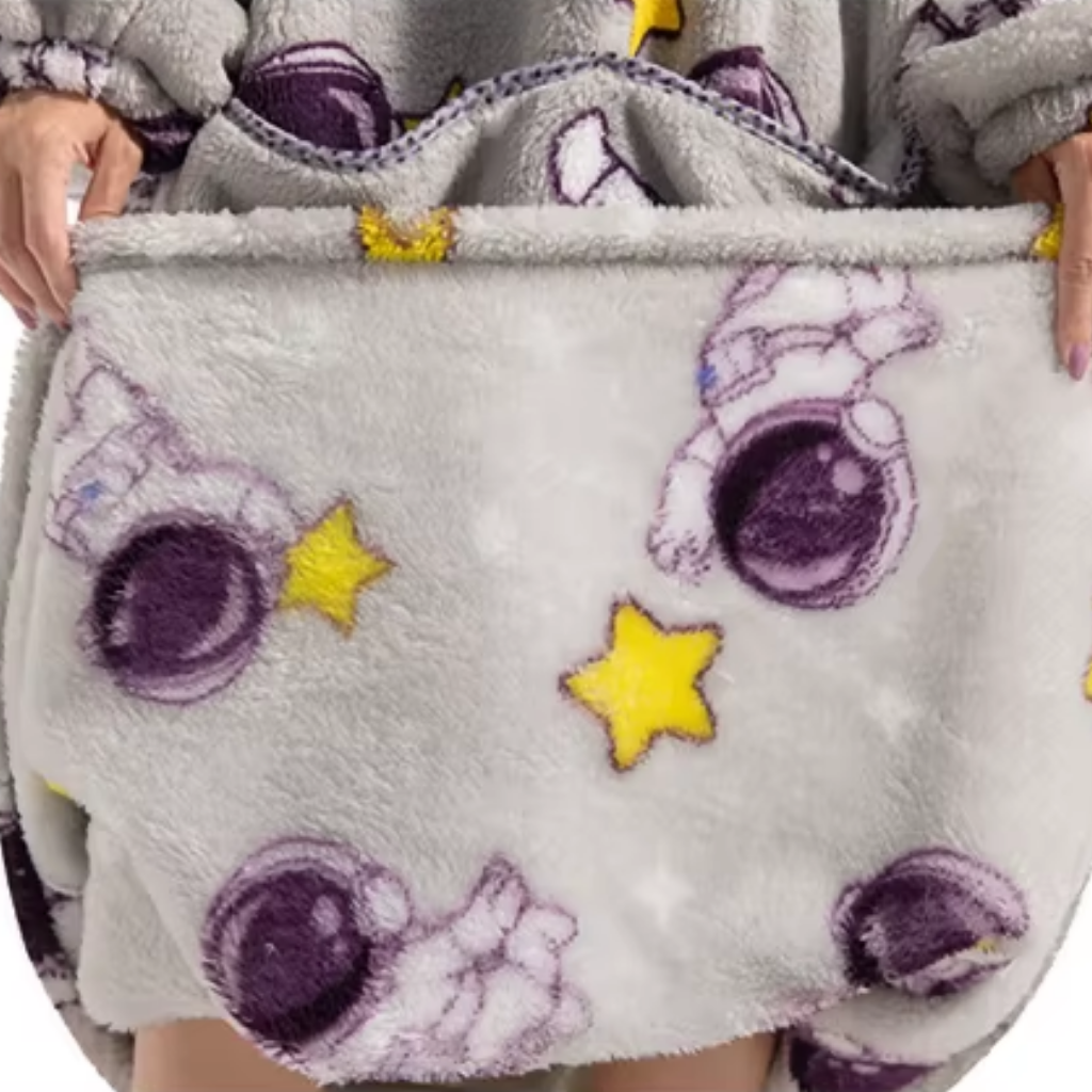 Den fluffiga hoodie-filten som kramar dig varm