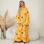 Den fluffiga hoodie-filten som kramar dig varm