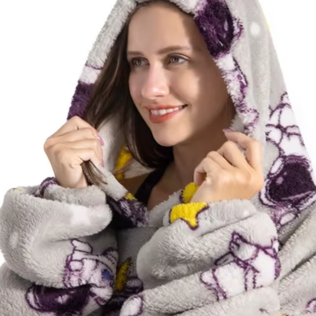 Den fluffiga hoodie-filten som kramar dig varm